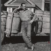 Mr. Lawrence J. Brown, potato farmer, FSA (Farm Security Administration) client of Eagle Lake, Maine. He has one hired helper and two small boys to work with him in the seed foundation unit.