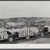 Potato trucks outside a starch factory in Caribou, Maine. There were almost fifty trucks in the line; some had been waiting for twenty-four hours for the potatoes to be graded and weighed.