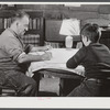 Canterbury, Connecticut. Nov. 1940. Mr. George Howe and one of his sons. His house was destroyed by the hurricane and he now lives in the cellar, the only part of his house that remains.