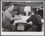 Canterbury, Connecticut. Nov. 1940. Mr. George Howe and one of his sons. His house was destroyed by the hurricane and he now lives in the cellar, the only part of his house that remains.