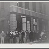 Crowds gathered around the "Norwich Express" newspaper office listening to the election returns. Norwich Connecticut.
