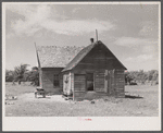 Thirty-five migrants use this farmhouse as their home. Near Old Trap, North Carolina.