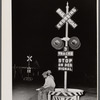 Migratory agricultural workers having supper at the railroad crossing at Camden, North Carolina.