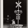 Migratory agricultural workers having supper at the railroad crossing at Camden, North Carolina.