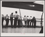 Migratory agricultural workers crossing from Norfolk to Cape Charles on the ferry. This group has just finished picking potatoes in North Carolina and is going to Onley, Virginia.