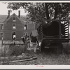 Florida migratory agricultural workers arrive at their new home near Onley, Virginia. There is no store at this place and the only drinking water is at the next farm.