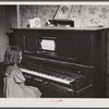 This old player piano was in an old farmhouse occupied by migrants near Cedarville, N.J..