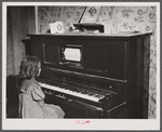 This old player piano was in an old farmhouse occupied by migrants near Cedarville, N.J..