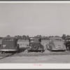 Cars of migratory tomato wrappers. Kings Creek, Maryland.
