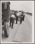 This truck carrying about thirty-seven North Carolina migrants to pick beans near Easton, Maryland broke down on the road near Princess Anne, Maryland.