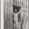 Father and two of his children at a migrants' camp at Staytonville, Delaware.