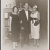 Graciela Garcia, Juan Rosario, and Melba Alvarado by bookcase