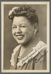 Graciela Garcia with flowers in hair in studio portrait