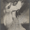 Eusebia Cosme in floor-length ruffled gown