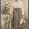 Atala Carranza in shirtwaist with hat in formal portrait