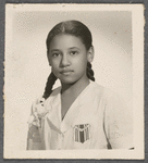 Teresa Roldan with two braids in formal portrait