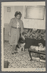 Teresa Roldan in living room with German Shepherd
