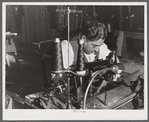 A sewing machine operator at "Levine & Levine" ladies coats who also runs a small farm near Colchester, Connecticut.