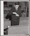 One of the Jewish residents of Colchester, Connecticut after the services in the local synagogue, taking some snuff.
