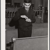 One of the Jewish residents of Colchester, Connecticut after the services in the local synagogue, taking some snuff.