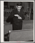 One of the Jewish residents of Colchester, Connecticut after the services in the local synagogue, taking some snuff.