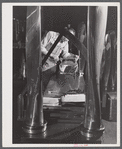 A propeller at the inspection table undergoing tests for pitch and curvature. Hamilton Standard Propeller Corporation. East Hartford, Connecticut.