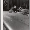 Working on an aileron assembly of a wing at the Vought Sikorsky Aircraft Corporation. Stratford, Connecticut.