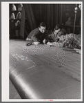 Working on an aileron assembly of a wing at the Vought Sikorsky Aircraft Corporation. Stratford, Connecticut.
