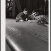 Working on an aileron assembly of a wing at the Vought Sikorsky Aircraft Corporation. Stratford, Connecticut.