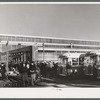 Workmen leaving the plant at Vought Sikorsky Aircraft Corporation. Stratford, Connecticut.