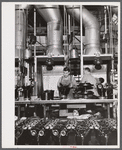 Cylinders for Pratt and Whitney engines being painted. East Hartford, Connecticut.