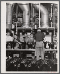 Cylinders for Pratt and Whitney engines being painted. East Hartford, Connecticut.