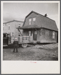 Moving a house in Fort Kent, Maine.