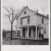 Post office and general store in Brooklyn, Connecticut, on a rainy day.
