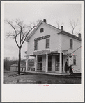 Post office and general store in Brooklyn, Connecticut, on a rainy day.