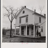 Post office and general store in Brooklyn, Connecticut, on a rainy day.