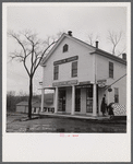 Post office and general store in Brooklyn, Connecticut, on a rainy day.