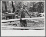 [Black] worker at a small sawmill works in southern Greene County, Georgia