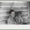Wife and child of a tenant farmer in northern Greene County, Georgia.