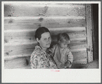 Wife and child of a tenant farmer in northern Greene County, Georgia.
