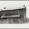 Old house occupied by a [Black] family, Penfield, Greene County, Georgia
