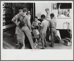Soldiers getting their shoes shined in Fredericksburg, Virginia.