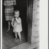 Youngest child of William Corneal, farmer who must move out of the area being taken over by the army for maneuver grounds in Caroline County, Virginia.