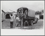 The CCC (Civilian Conservation Corps) helped move some of the families out of the area being taken over by the army in Caroline County, Virginia.