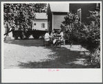 A bridge party on the lawn of a home in the outskirts of White River Junction, Vermont.