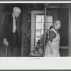 Aged couple at an auction in East Albany, Vermont.
