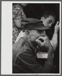 Spectator at an auction in East Albany, Vermont.