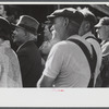 Spectators at an auction in East Albany, Vermont.