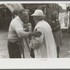 Tintype photographer trying to make a sale at the Champlain Valley Exposition, Essex Junction, Vermont.