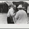 Tintype photographer trying to make a sale at the Champlain Valley Exposition, Essex Junction, Vermont.